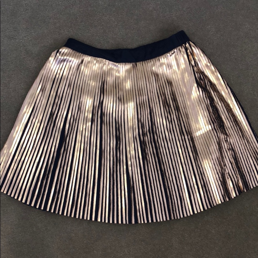 Johnnie B rose gold and navy blue skirt.
